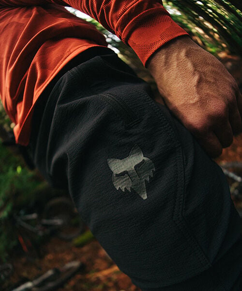 Close up of MTB pants with Fox logo